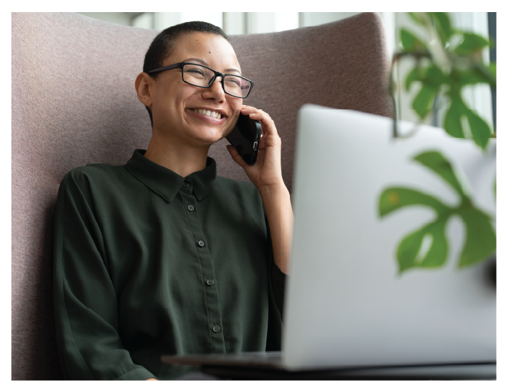 Women talking in phone smiling