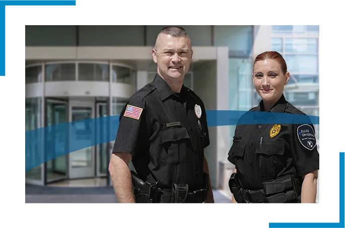 Two security officers in black uniform