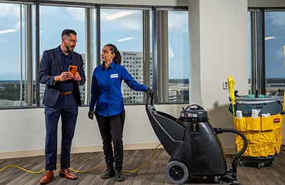 man and woman talking, janitorial services