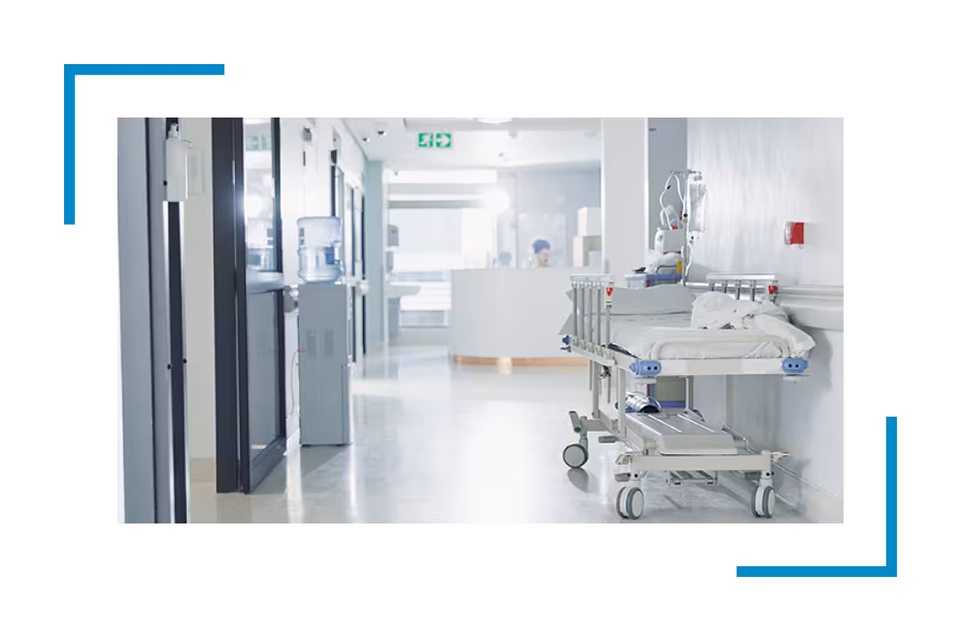 hospital bed in hallway, janitorial services
