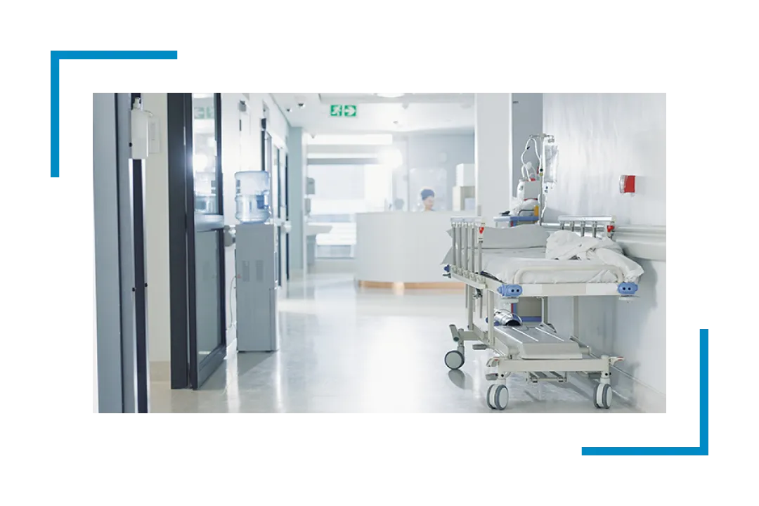 hospital bed in hallway, janitorial services