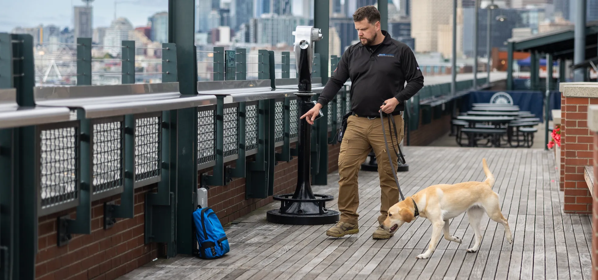 officer with canine in a public place