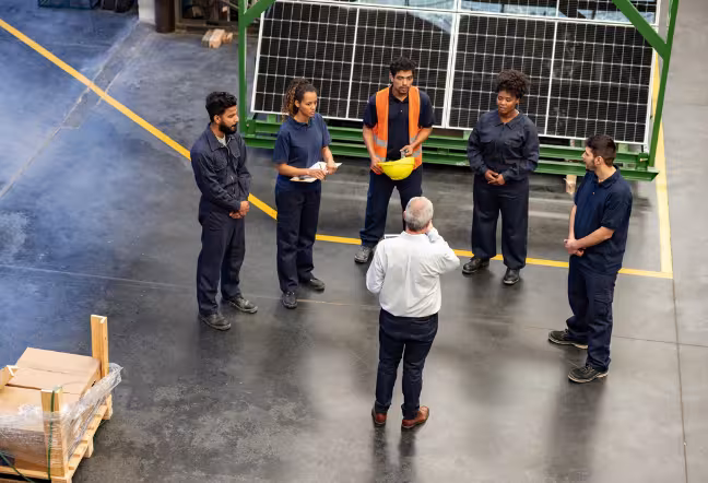 aerospace workers discussing